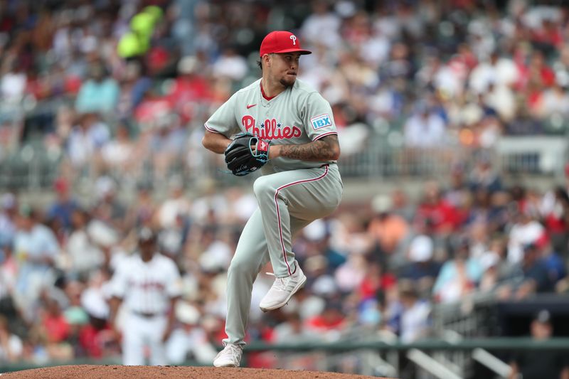 Jun 29, 2025; Cumberland, Georgia, Philadelphia Phillies relief pitcher Orion Kerkering (50) pitches during a game against the Atlanta Braves during the eighth inning at Truist Park. Mandatory Credit: Mady Mertens-Imagn Images