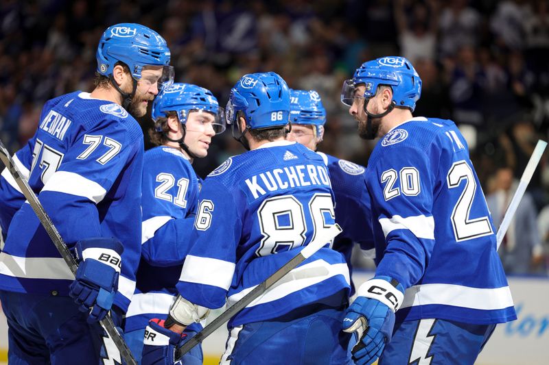 Oct 21, 2023; Tampa, Florida, USA;  Tampa Bay Lightning right wing Nikita Kucherov (86) celebrates his goal against the Toronto Maple Leafs in the first period at Amalie Arena. Mandatory Credit: Nathan Ray Seebeck-USA TODAY Sports