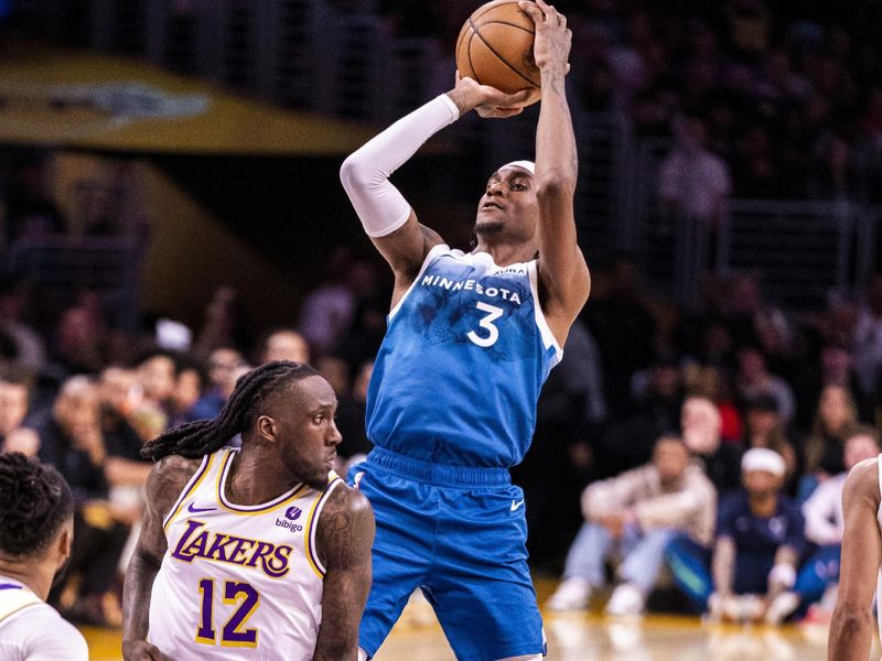 LOS ANGELES, CA - MARCH 10: Jaden McDaniels #3 of the Minnesota Timberwolves shoots the ball during the game against the Los Angeles Lakers on March 10, 2024 at Crypto.Com Arena in Los Angeles, California. NOTE TO USER: User expressly acknowledges and agrees that, by downloading and/or using this Photograph, user is consenting to the terms and conditions of the Getty Images License Agreement. Mandatory Copyright Notice: Copyright 2024 NBAE (Photo by Tyler Ross/NBAE via Getty Images)