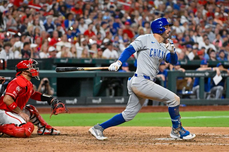 May 25, 2024; St. Louis, Missouri, USA;  Chicago Cubs left fielder Mike Tauchman (40) hits a one run single against the St. Louis Cardinals during the ninth inning at Busch Stadium. Mandatory Credit: Jeff Curry-USA TODAY Sports