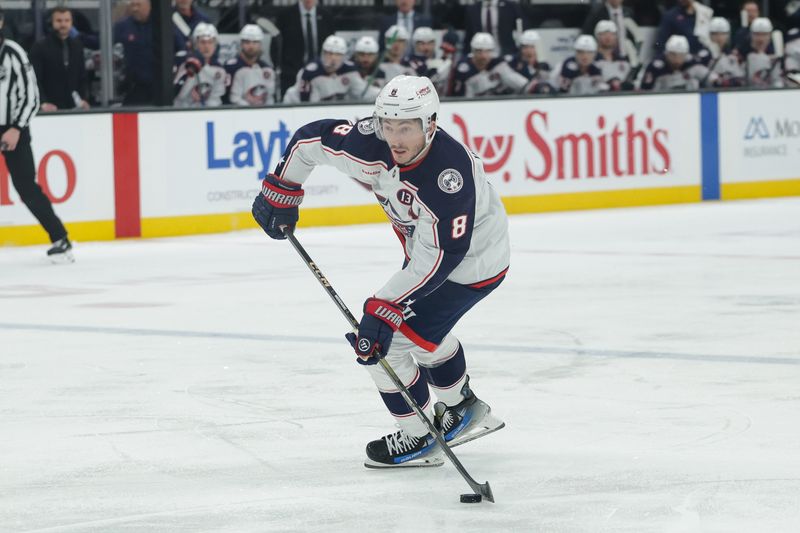 Jan 31, 2025; Salt Lake City, Utah, USA;  Columbus Blue Jackets defenseman Zach Werenski (8) controls the puck during the third period against the Utah Hockey Club at Delta Center. Mandatory Credit: Chris Nicoll-Imagn Images