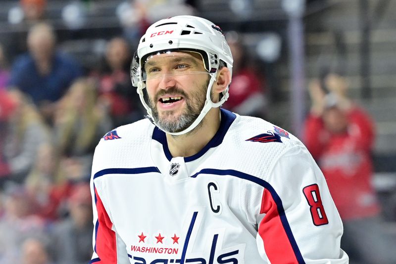 Jan 19, 2023; Tempe, Arizona, USA; Washington Capitals left wing Alex Ovechkin (8) celebrates a goal by center Dylan Strome (not pictured) in the first period against the Arizona Coyotes at Mullett Arena. Mandatory Credit: Matt Kartozian-USA TODAY Sports