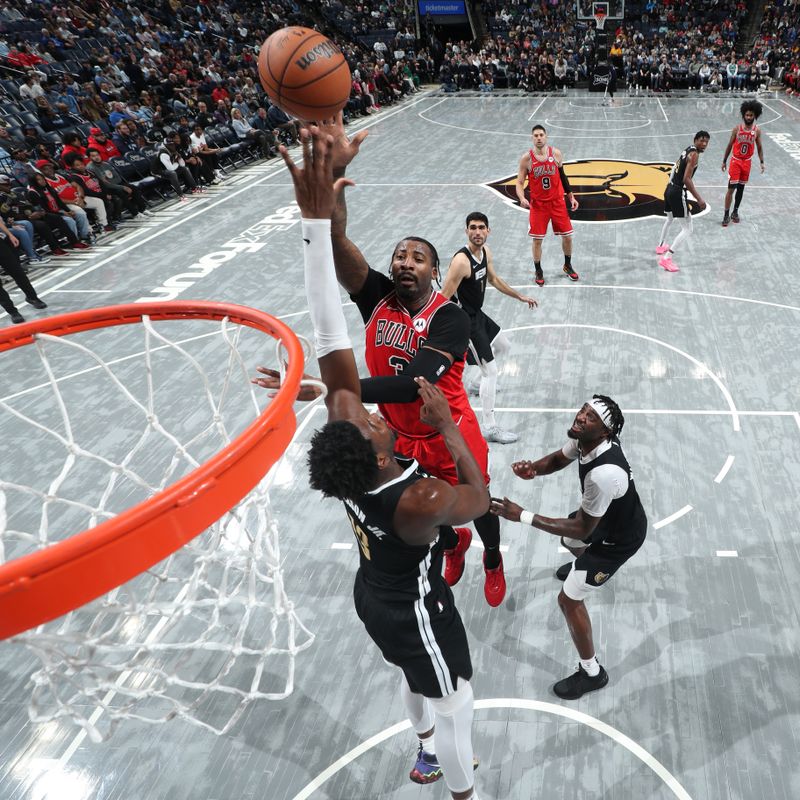 MEMPHIS, TN - FEBRUARY 8: Andre Drummond #3 of the Chicago Bulls drives to the basket during the game against the Memphis Grizzlies on February 8, 2024 at FedExForum in Memphis, Tennessee. NOTE TO USER: User expressly acknowledges and agrees that, by downloading and or using this photograph, User is consenting to the terms and conditions of the Getty Images License Agreement. Mandatory Copyright Notice: Copyright 2024 NBAE (Photo by Joe Murphy/NBAE via Getty Images)