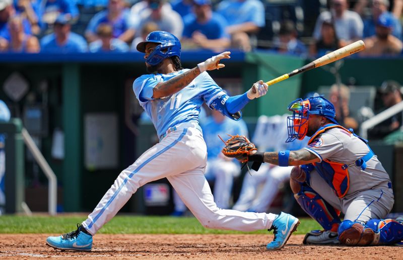 Aug 3, 2023; Kansas City, Missouri, USA; Kansas City Royals third baseman Maikel Garcia (11) hit a single against the New York Mets during the seventh inning at Kauffman Stadium. Mandatory Credit: Jay Biggerstaff-USA TODAY Sports