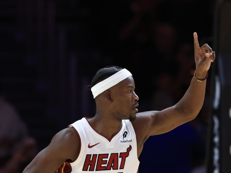 MIAMI, FLORIDA - OCTOBER 23: Jimmy Butler #22 of the Miami Heat reacts to a basket against the Orlando Magic during the second half at Kaseya Center on October 23, 2024 in Miami, Florida. NOTE TO USER: User expressly acknowledges and agrees that, by downloading and or using this photograph, User is consenting to the terms and conditions of the Getty Images License Agreement. (Photo by Carmen Mandato/Getty Images)