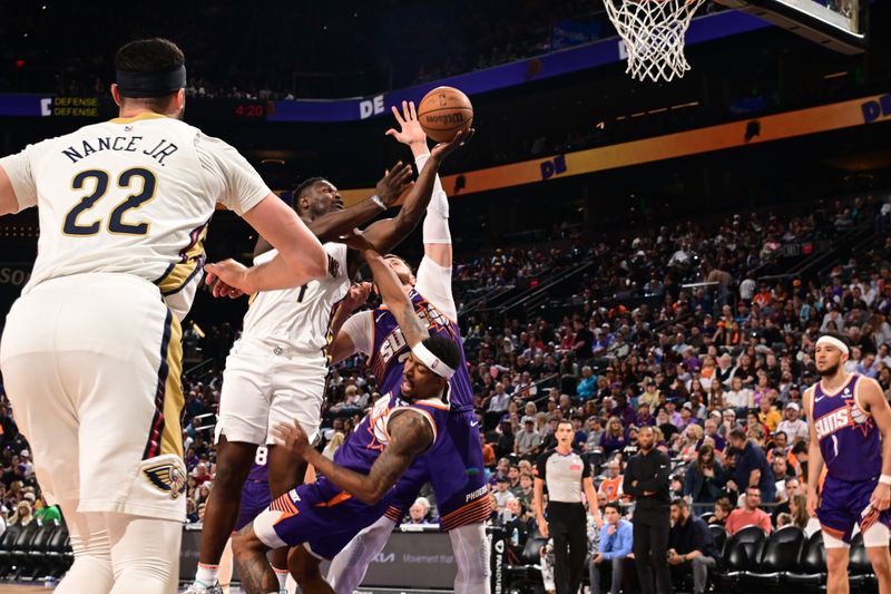 PHOENIX, AZ - APRIL 7: Zion Williamson #1 of the New Orleans Pelicans drives to the basket during the game against the Phoenix Suns on April 7, 2024 at Footprint Center in Phoenix, Arizona. NOTE TO USER: User expressly acknowledges and agrees that, by downloading and or using this photograph, user is consenting to the terms and conditions of the Getty Images License Agreement. Mandatory Copyright Notice: Copyright 2024 NBAE (Photo by Kate Frese/NBAE via Getty Images)