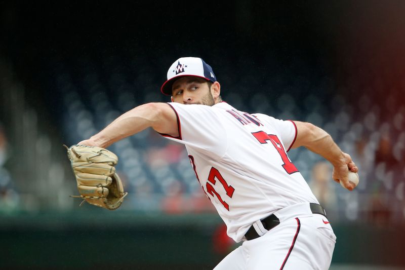 Jun 22, 2023; Washington, District of Columbia, USA; Washington Nationals relief pitcher Cory Abbott (77) throws the ball during the ninth inning against the Arizona Diamondbacks at Nationals Park. Mandatory Credit: Amber Searls-USA TODAY Sports