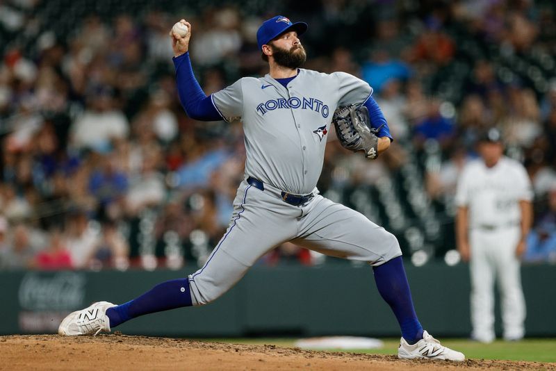 Aug 5, 2025; Denver, Colorado, USA; Toronto Blue Jays relief pitcher Tommy Nance (45) pitches in the ninth inning against the Colorado Rockies at Coors Field. Mandatory Credit: Isaiah J. Downing-Imagn Images