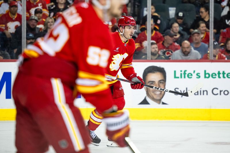 Apr 5, 2025; Calgary, Alberta, CAN; Calgary Flames defenseman Joel Hanley (44) in action against the Vegas Golden Knights during the third period at Scotiabank Saddledome. Mandatory Credit: Brett Holmes-Imagn Images