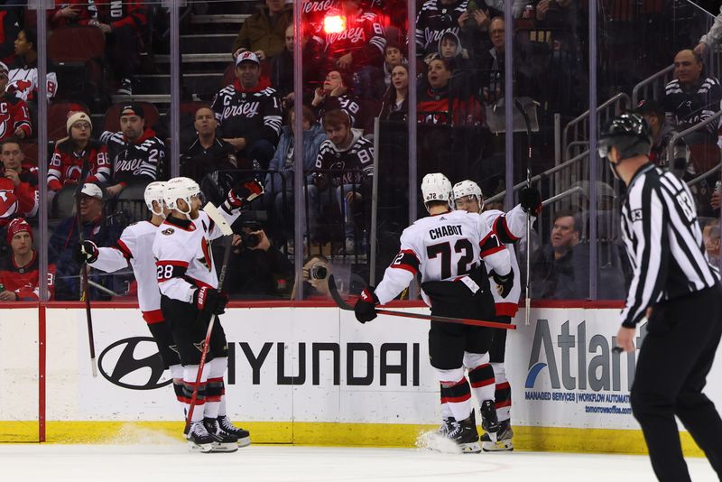 Mar 23, 2024; Newark, New Jersey, USA; Ottawa Senators left wing Angus Crookshank (59) celebrates his goal against the New Jersey Devils during the second period at Prudential Center. Mandatory Credit: Ed Mulholland-USA TODAY Sports