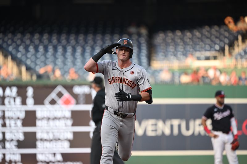 Aug 5, 2024; Washington, District of Columbia, USA; San Francisco Giants center fielder Tyler Fitzgerald (49) salutes as he jogs around the bases after hitting a home run against the Washington Nationals during the first inning at Nationals Park. Mandatory Credit: Rafael Suanes-USA TODAY Sports