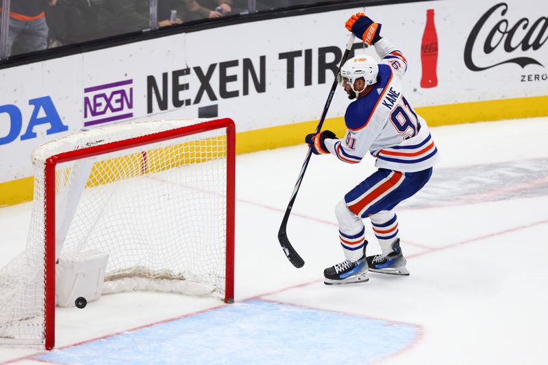 Feb 9, 2024; Anaheim, California, USA; Edmonton Oilers left wing Evander Kane (91) scores a goal during the third period of a game against the Anaheim Ducks at Honda Center. Mandatory Credit: Jessica Alcheh-USA TODAY Sports