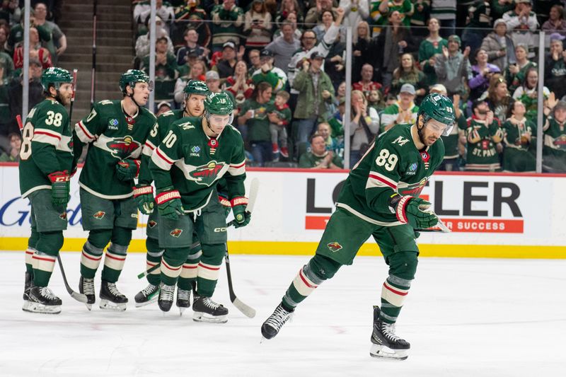 Mar 3, 2024; Saint Paul, Minnesota, USA; Minnesota Wild center Frederick Gaudreau (89) and teammates skate to the bench after scoring against the San Jose Sharks in the second period at Xcel Energy Center. Mandatory Credit: Matt Blewett-USA TODAY Sports