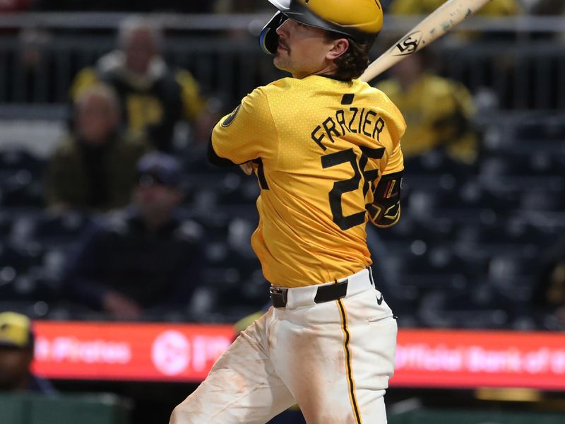 May 23, 2025; Pittsburgh, Pennsylvania, USA;  Pittsburgh Pirates second baseman Adam Frazier (26) hits a single against the Milwaukee Brewers during the eighth inning at PNC Park. Mandatory Credit: Charles LeClaire-Imagn Images