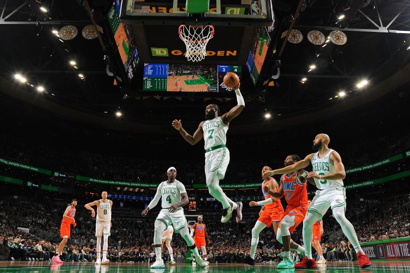 BOSTON, MA - APRIL 3: Jaylen Brown #7 of the Boston Celtics rebounds during the game against the Oklahoma City Thunder on April 3, 2024 at the TD Garden in Boston, Massachusetts. NOTE TO USER: User expressly acknowledges and agrees that, by downloading and or using this photograph, User is consenting to the terms and conditions of the Getty Images License Agreement. Mandatory Copyright Notice: Copyright 2024 NBAE  (Photo by Brian Babineau/NBAE via Getty Images)