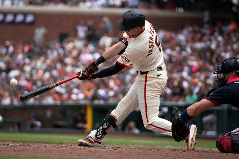 Jun 8, 2025; San Francisco, California, USA; San Francisco Giants right fielder Mike Yastrzemski (5) connects for a two-RBI double against the Atlanta Braves during the fourth inning at Oracle Park. Mandatory Credit: D. Ross Cameron-Imagn Images