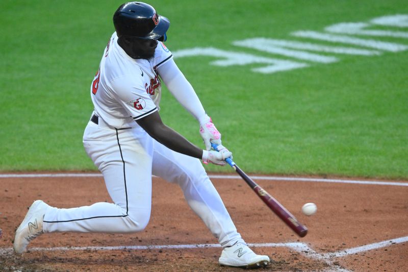 Aug 14, 2024; Cleveland, Ohio, USA; Cleveland Guardians right fielder Jhonkensy Noel (43) hits a three-run home run in the fourth inning against the Chicago Cubs at Progressive Field. Mandatory Credit: David Richard-USA TODAY Sports