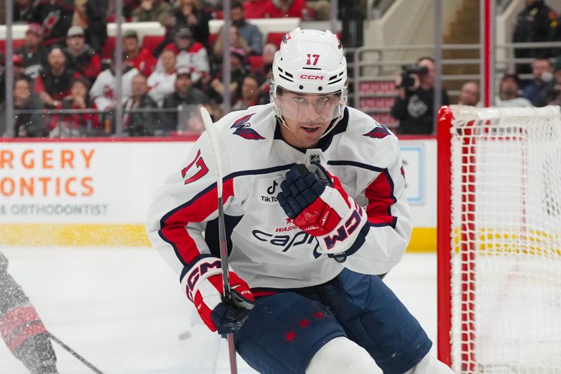 Nov 11, 2025; Raleigh, North Carolina, USA; Washington Capitals center Dylan Strome (17) celebrates his goal against the Carolina Hurricanes during the second period at Lenovo Center. Mandatory Credit: James Guillory-Imagn Images