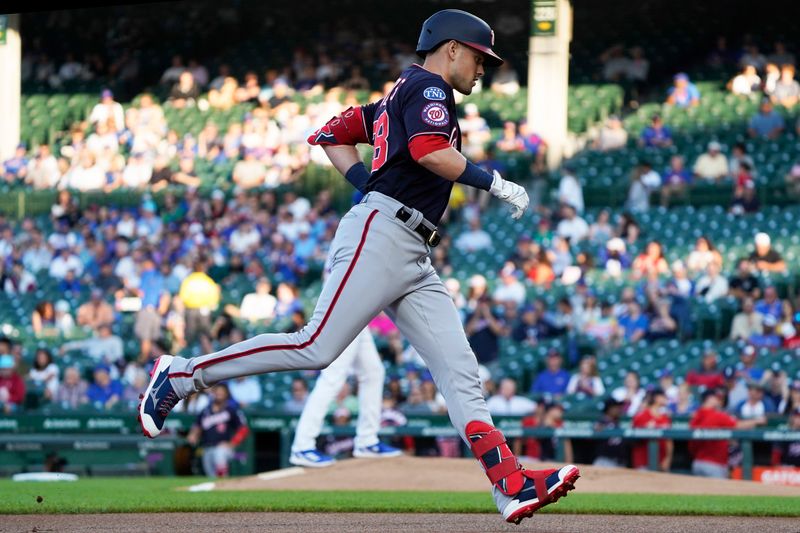 Jul 18, 2023; Chicago, Illinois, USA; Washington Nationals right fielder Lane Thomas (28) runs the bases after hitting a home run against the Chicago Cubs during the first inning at Wrigley Field. Mandatory Credit: David Banks-USA TODAY Sports