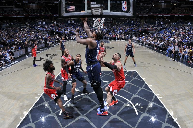 ORLANDO, FL - APRIL 7: Wendell Carter Jr. #34 of the Orlando Magic drives to the basket during the game against the Chicago Bulls on April 7, 2024 at the Kia Center in Orlando, Florida. NOTE TO USER: User expressly acknowledges and agrees that, by downloading and or using this photograph, User is consenting to the terms and conditions of the Getty Images License Agreement. Mandatory Copyright Notice: Copyright 2024 NBAE (Photo by Fernando Medina/NBAE via Getty Images)