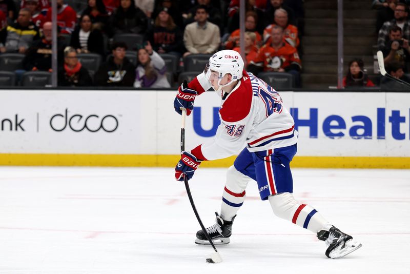 Mar 6, 2026; Anaheim, California, USA;  Montreal Canadiens defenseman Lane Hutson (48) passes the puck during the second period against the Anaheim Ducks at Honda Center. Mandatory Credit: Kiyoshi Mio-Imagn Images