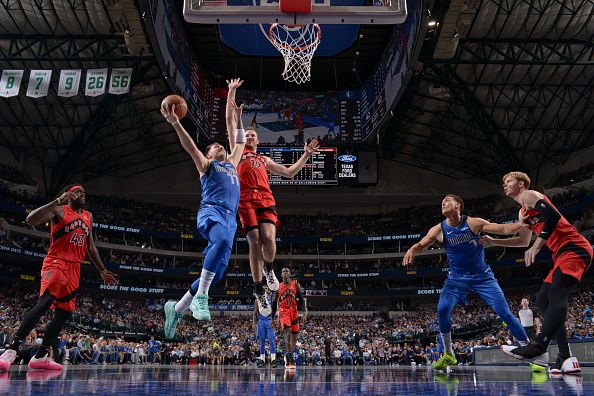 DALLAS, TX - NOVEMBER 8: Luka Doncic #77 of the Dallas Mavericks drives to the basket during the game against the Toronto Raptors on November 8, 2023 at the American Airlines Center in Dallas, Texas. NOTE TO USER: User expressly acknowledges and agrees that, by downloading and or using this photograph, User is consenting to the terms and conditions of the Getty Images License Agreement. Mandatory Copyright Notice: Copyright 2023 NBAE (Photo by Glenn James/NBAE via Getty Images)