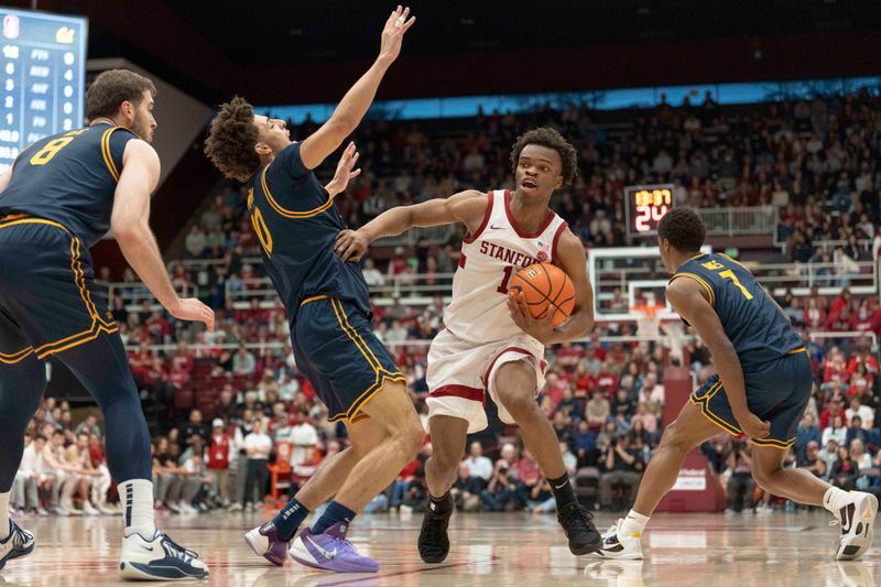Jan 24, 2026; Stanford, California, USA;  Stanford Cardinal guard Ebuka Okorie (1) drives the ball during the first half against California Golden Bears guard Justin Pippen (10) at Maples Pavilion. Mandatory Credit: Stan Szeto-Imagn Images