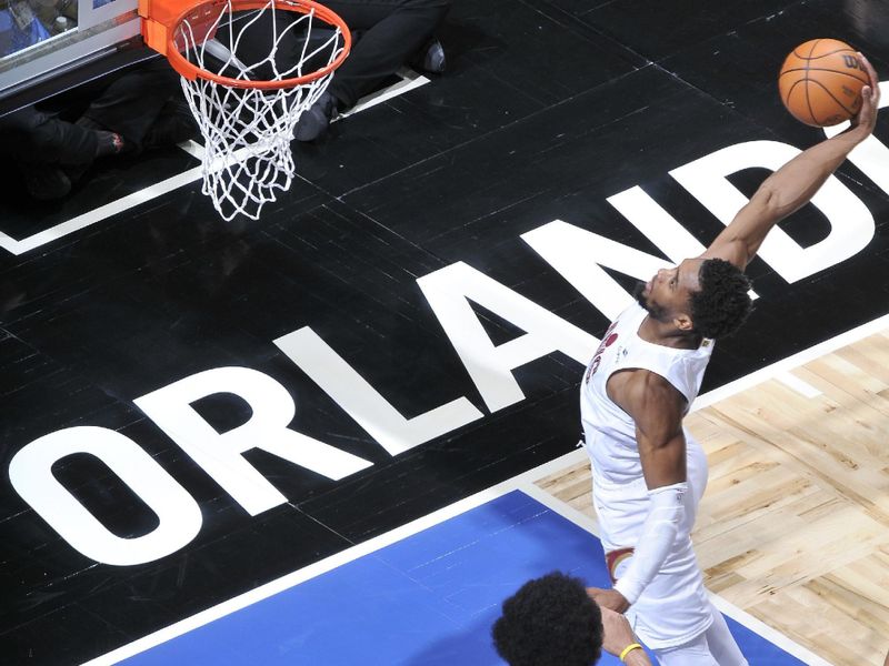 ORLANDO, FL - JANUARY 22: Donovan Mitchell #45 of the Cleveland Cavaliers drives to the basket during the game against the Orlando Magic on January 22, 2024 at Kia Center in Orlando, Florida. NOTE TO USER: User expressly acknowledges and agrees that, by downloading and or using this photograph, User is consenting to the terms and conditions of the Getty Images License Agreement. Mandatory Copyright Notice: Copyright 2024 NBAE (Photo by Fernando Medina/NBAE via Getty Images)