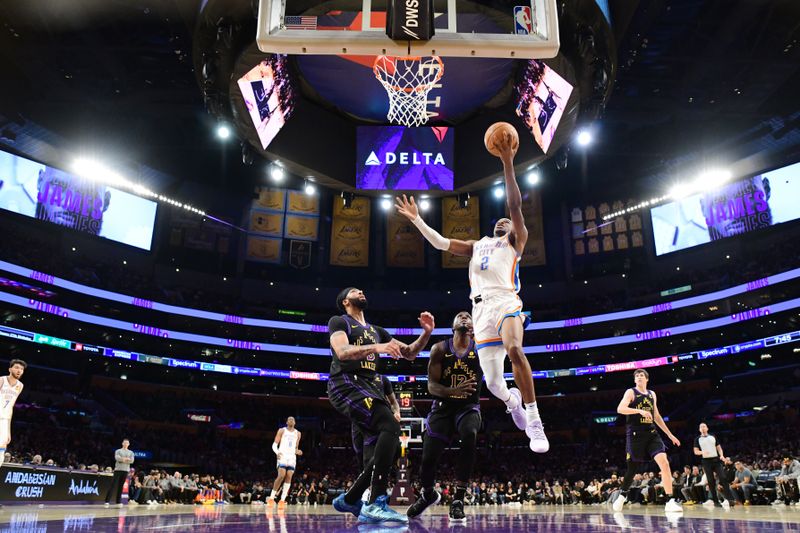 LOS ANGELES, CA - JANUARY 15: Shai Gilgeous-Alexander #2 of the Oklahoma City Thunder drives to the basket during the game against the Los Angeles Lakers on January 15, 2024 at Crypto.Com Arena in Los Angeles, California. NOTE TO USER: User expressly acknowledges and agrees that, by downloading and/or using this Photograph, user is consenting to the terms and conditions of the Getty Images License Agreement. Mandatory Copyright Notice: Copyright 2024 NBAE (Photo by Adam Pantozzi/NBAE via Getty Images)