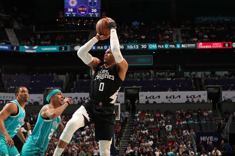 CHARLOTTE, NC - MARCH 31: Russell Westbrook #0 of the LA Clippers shoots the ball during the game against the Charlotte Hornets on March 31, 2024 at Spectrum Center in Charlotte, North Carolina. NOTE TO USER: User expressly acknowledges and agrees that, by downloading and or using this photograph, User is consenting to the terms and conditions of the Getty Images License Agreement. Mandatory Copyright Notice: Copyright 2024 NBAE (Photo by Kent Smith/NBAE via Getty Images)