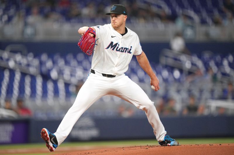 May 21, 2024; Miami, Florida, USA;  Miami Marlins starting pitcher Trevor Rogers (28) pitches in the first inning against the Milwaukee Brewers at loanDepot Park. Mandatory Credit: Jim Rassol-USA TODAY Sports