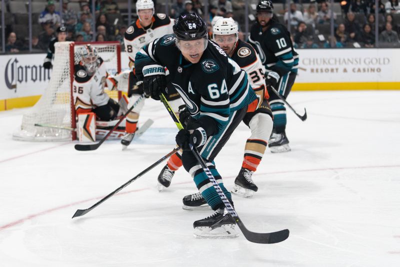 Feb 29, 2024; San Jose, California, USA;  San Jose Sharks center Mikael Granlund (64) chases after the puck during the second period against the Anaheim Ducks at SAP Center at San Jose. Mandatory Credit: Stan Szeto-USA TODAY Sports