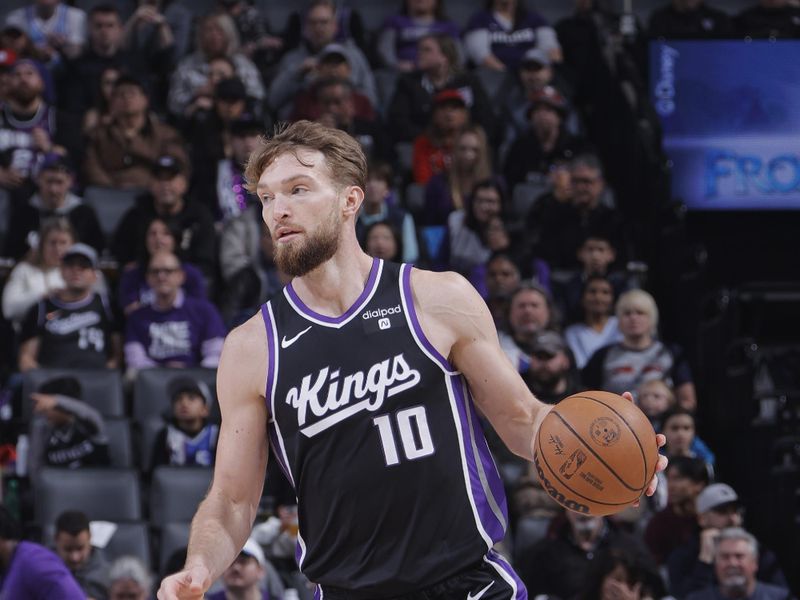 SACRAMENTO, CA - FEBRUARY 7:  Domantas Sabonis #10 of the Sacramento Kings dribbles the ball during the game against the Detroit Pistons on February 7, 2024 at Golden 1 Center in Sacramento, California. NOTE TO USER: User expressly acknowledges and agrees that, by downloading and or using this Photograph, user is consenting to the terms and conditions of the Getty Images License Agreement. Mandatory Copyright Notice: Copyright 2024 NBAE (Photo by Rocky Widner/NBAE via Getty Images)