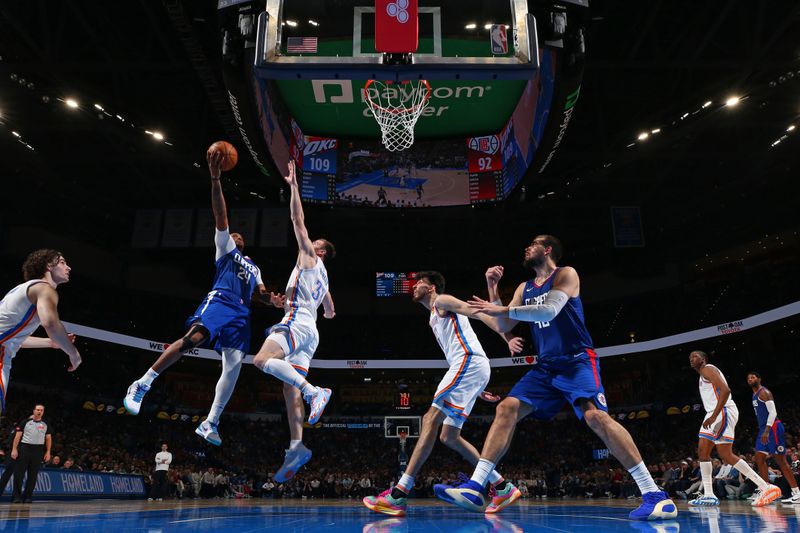 OKLAHOMA CITY, OK - FEBRUARY 22:  Norman Powell #24 of the LA Clippers drives to the basket during the game against the Oklahoma City Thunder on February 22SF, 2024 at Paycom Arena in Oklahoma City, Oklahoma. NOTE TO USER: User expressly acknowledges and agrees that, by downloading and or using this photograph, User is consenting to the terms and conditions of the Getty Images License Agreement. Mandatory Copyright Notice: Copyright 2024 NBAE (Photo by Zach Beeker/NBAE via Getty Images)