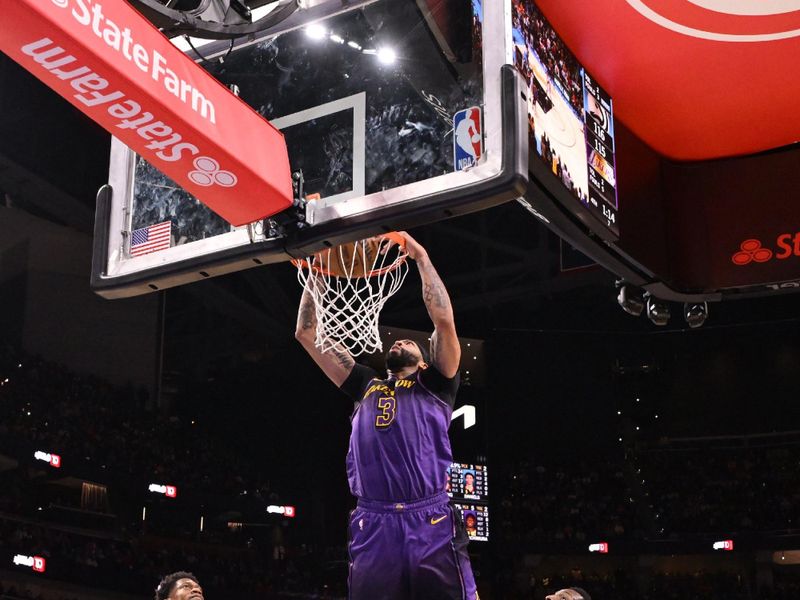 ATLANTA, GA - DECEMBER 6: Anthony Davis #3 of the Los Angeles Lakers dunks the ball during the game against the Atlanta Hawks on December 6, 2024 at State Farm Arena in Atlanta, Georgia.  NOTE TO USER: User expressly acknowledges and agrees that, by downloading and/or using this Photograph, user is consenting to the terms and conditions of the Getty Images License Agreement. Mandatory Copyright Notice: Copyright 2024 NBAE (Photo by Adam Hagy/NBAE via Getty Images)