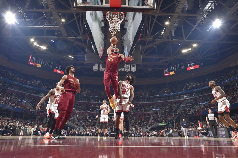 CLEVELAND, OH - FEBRUARY 14: Donovan Mitchell #45 of the Cleveland Cavaliers dunks the ball during the game against the Chicago Bulls on February 14, 2024 at Rocket Mortgage FieldHouse in Cleveland, Ohio. NOTE TO USER: User expressly acknowledges and agrees that, by downloading and/or using this Photograph, user is consenting to the terms and conditions of the Getty Images License Agreement. Mandatory Copyright Notice: Copyright 2024 NBAE (Photo by David Liam Kyle/NBAE via Getty Images)