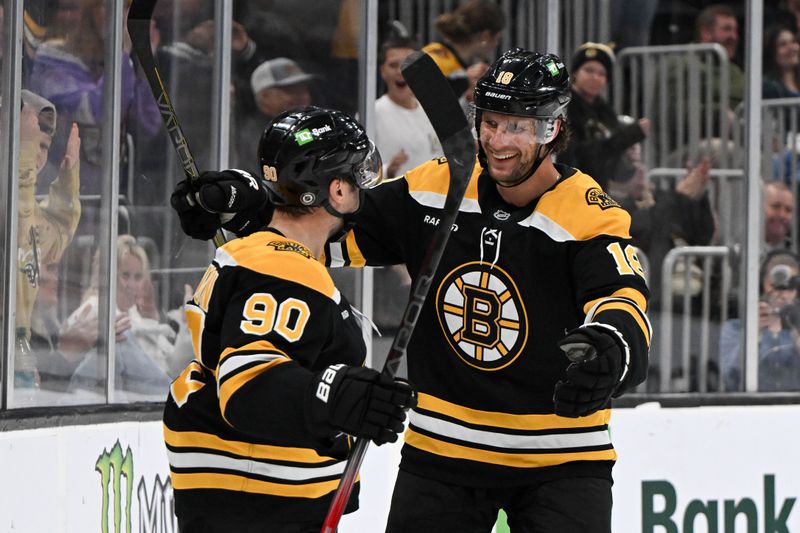 Oct 1, 2024; Boston, Massachusetts, USA; Boston Bruins forward Tyler Johnson celebrates with center Pavel Zacha (18) after scoring a goal against the Philadelphia Flyers during the third period at the TD Garden. Mandatory Credit: Brian Fluharty-Imagn Images