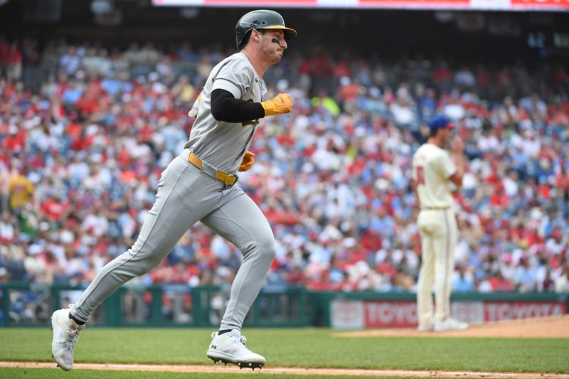 Jul 14, 2024; Philadelphia, Pennsylvania, USA; Oakland Athletics outfielder Brent Rooker (25) hits a two-run home run off Philadelphia Phillies pitcher Michael Mercado (63) during the fourth inning at Citizens Bank Park. Mandatory Credit: Eric Hartline-USA TODAY Sports