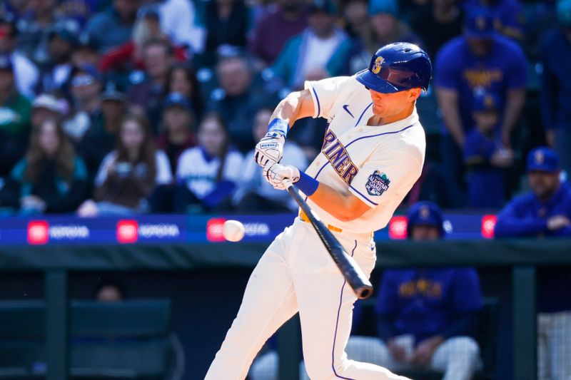 Oct 1, 2023; Seattle, Washington, USA; Seattle Mariners left fielder Dominic Canzone (8) hits an RBI-fielders choice against the Texas Rangers during the fourth inning at T-Mobile Park. Mandatory Credit: Joe Nicholson-USA TODAY Sports