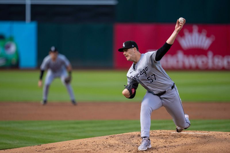 Aug 5, 2024; Oakland, California, USA;  Chicago White Sox starting pitcher Ky Bush (57) delivers a pitch against the Oakland Athletics during the first inning at Oakland-Alameda County Coliseum. Mandatory Credit: Neville E. Guard-USA TODAY Sports