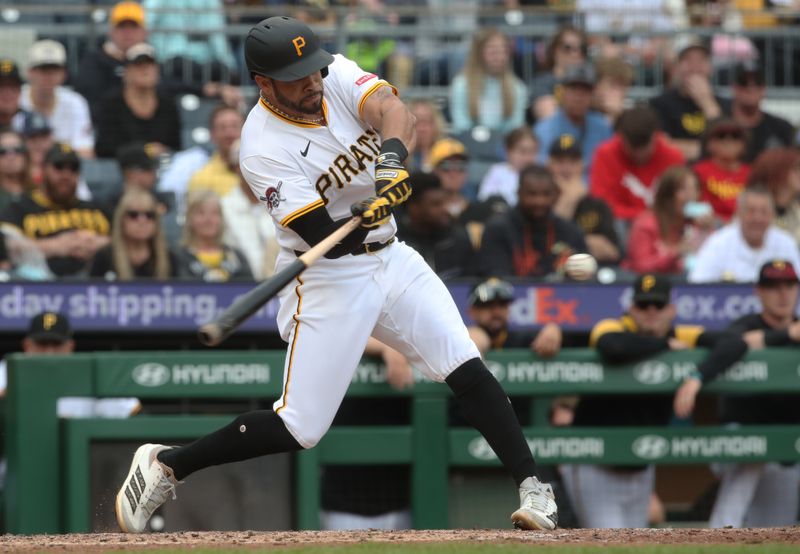 May 25, 2025; Pittsburgh, Pennsylvania, USA;  Pittsburgh Pirates left fielder Tommy Pham (28) hits an RBI single against the Milwaukee Brewers during the sixth inning at PNC Park. Mandatory Credit: Charles LeClaire-Imagn Images
