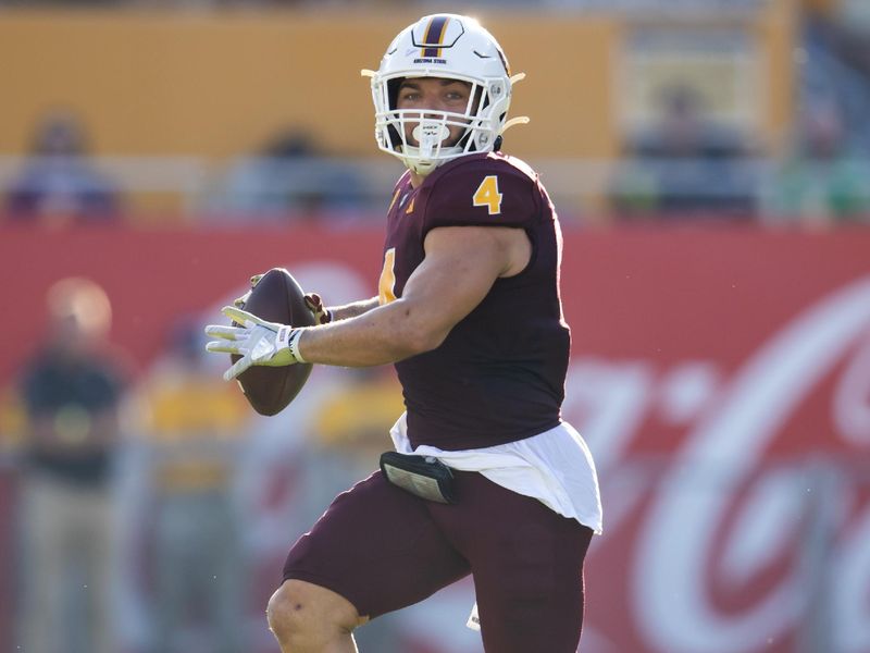 Nov 18, 2023; Tempe, Arizona, USA; Arizona State Sun Devils running back Cameron Skattebo (4) throws a pass against the Oregon Ducks in the second half at Mountain America Stadium. Mandatory Credit: Mark J. Rebilas-USA TODAY Sports