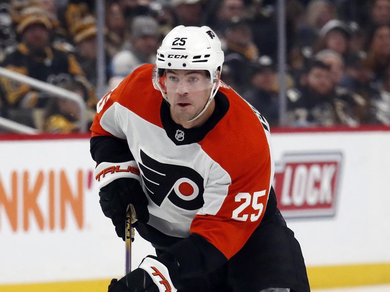 Feb 25, 2024; Pittsburgh, Pennsylvania, USA;  Philadelphia Flyers center Ryan Poehling (25) skates spice with the puck against the Pittsburgh Penguins during the third period at PPG Paints Arena.  Pittsburgh won 7-6. Mandatory Credit: Charles LeClaire-USA TODAY Sports