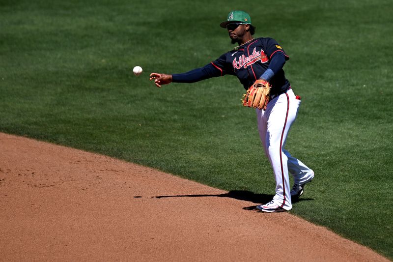 Mar 17, 2025; North Port, Florida, USA; Atlanta Braves second baseman Ozzie Albies (1) throws to first base in the fifth  inning against the Boston Red Sox during spring training at CoolToday Park. Mandatory Credit: Jonathan Dyer-Imagn Images