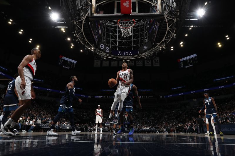 MINNEAPOLIS, MN -  MARCH 4: Jabari Walker #34 of the Portland Trail Blazers rebounds the ball during the game against the Minnesota Timberwolves on March 4, 2024 at Target Center in Minneapolis, Minnesota. NOTE TO USER: User expressly acknowledges and agrees that, by downloading and or using this Photograph, user is consenting to the terms and conditions of the Getty Images License Agreement. Mandatory Copyright Notice: Copyright 2024 NBAE (Photo by Jordan Johnson/NBAE via Getty Images)