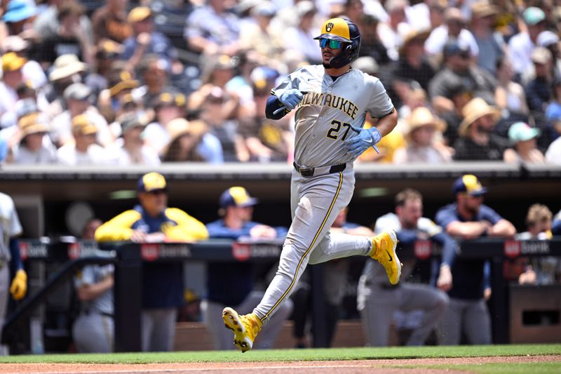 Jun 23, 2024; San Diego, California, USA; Milwaukee Brewers shortstop Willy Adames (27) scores a run against the San Diego Padres during the second inning at Petco Park. Mandatory Credit: Orlando Ramirez-USA TODAY Sports