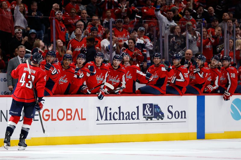 Oct 8, 2025; Washington, District of Columbia, USA; Washington Capitals right wing Tom Wilson (43) celebrates with teammates after scoring a goal against the Boston Bruins during the third period at Capital One Arena. Mandatory Credit: Geoff Burke-Imagn Images