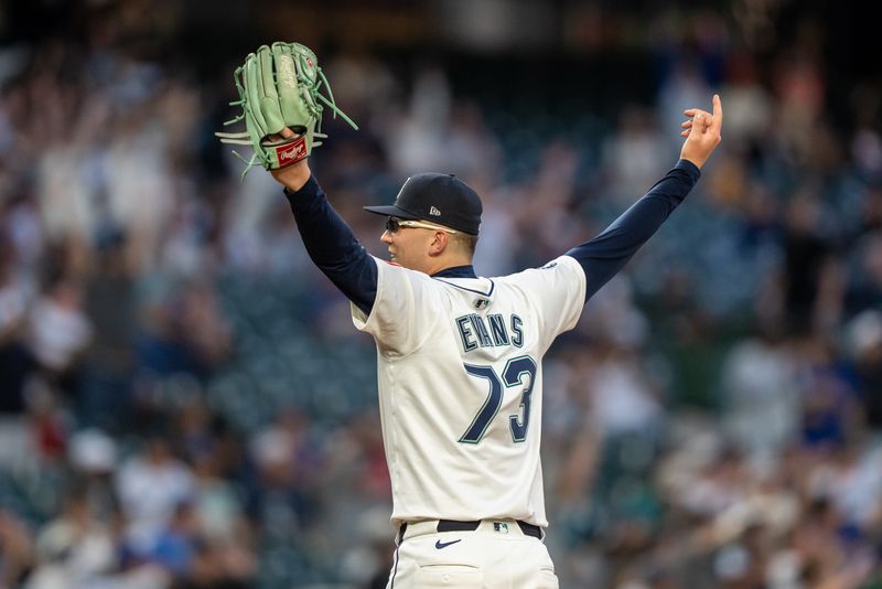 May 27, 2025; Seattle, Washington, USA;  Seattle Mariners starting pitcher Logan Evans  celebrates during the eighth inning against the Washington Nationals at T-Mobile Park. Mandatory Credit: Stephen Brashear-Imagn Images