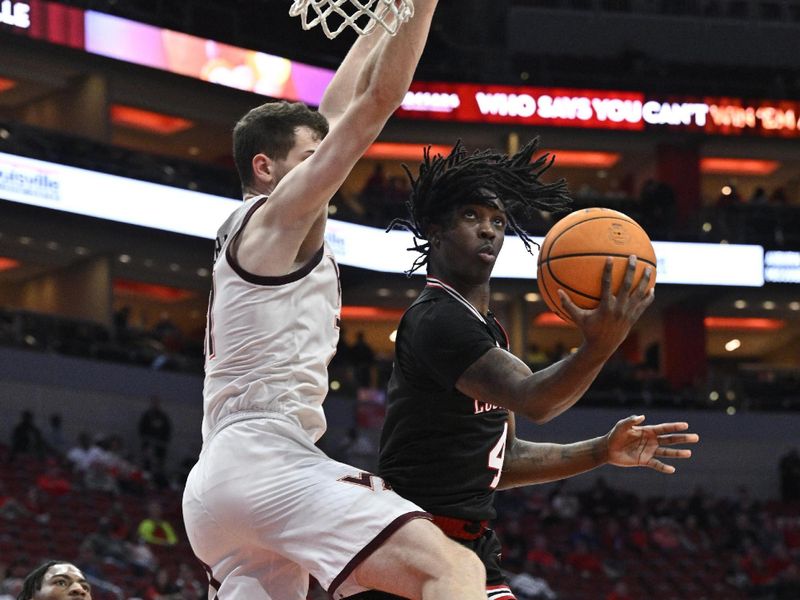 Mar 5, 2024; Louisville, Kentucky, USA; Louisville Cardinals guard Ty-Laur Johnson (4) shoots against Virginia Tech Hokies forward Robbie Beran (31) during the second half at KFC Yum! Center. Virginia Tech defeated Louisville 80-64. Mandatory Credit: Jamie Rhodes-USA TODAY Sports