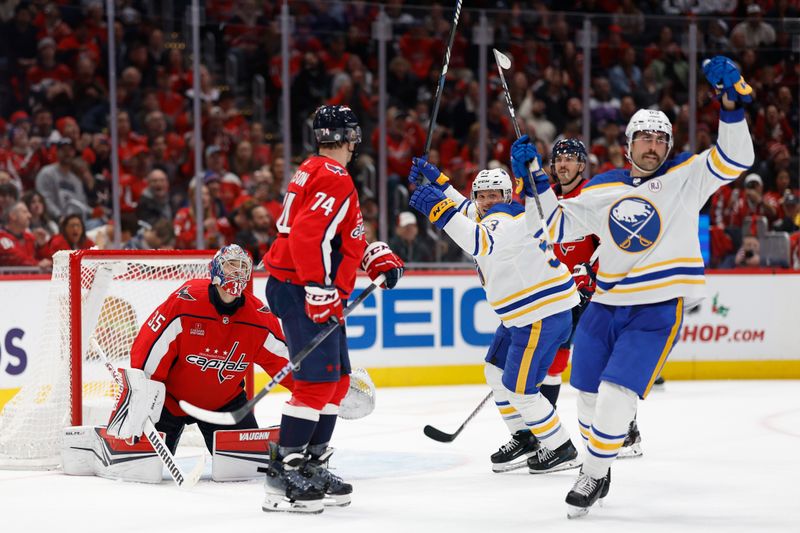 Nov 22, 2023; Washington, District of Columbia, USA; Buffalo Sabres players celebrate after a goal by Buffalo Sabres center Dylan Cozens (not pictured) on Washington Capitals goaltender Darcy Kuemper (35) in the second period at Capital One Arena. Mandatory Credit: Geoff Burke-USA TODAY Sports